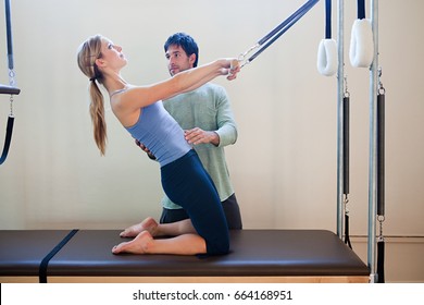 Women Doing Pilates With Instructor