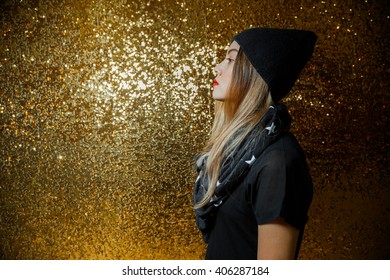 women dressed black fun night clubs on gold background