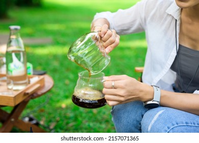 Women Drift Good Coffee In The Garden Outdoor.