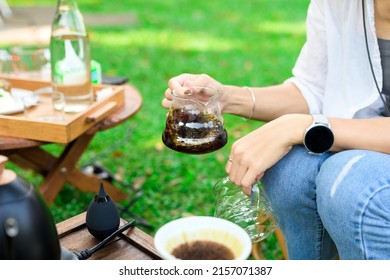 Women Drift Good Coffee In The Garden Outdoor.