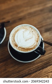 Women Drinking Chai Latte At Coffee Shop, Seasonal Coffee Drinks With Latter Art.