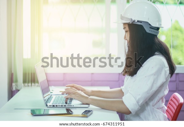Women\
Engineering working Engineering workplace - Engineering project,\
blueprints, ruler, calculator, laptop and divider compass.\
Construction concept. Engineering .selective\
focus