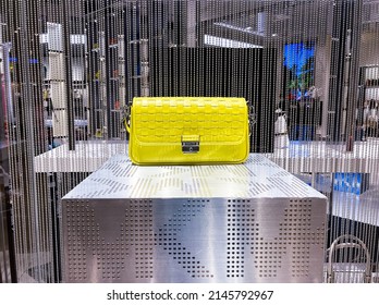 Women Fashion Yellow Handbag Display On Shelf