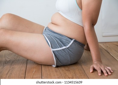 women fat with belly fat on white background