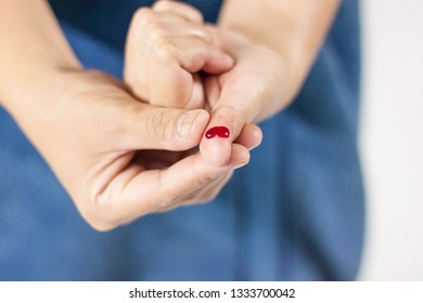 Women fingers have blood, Focusing on the fingers only.