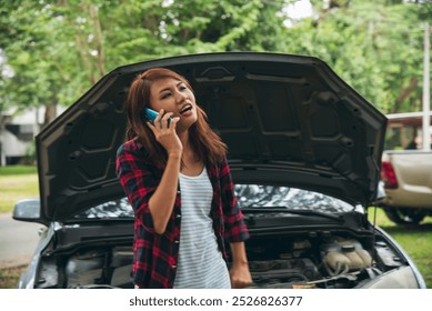 Women fix car call for help use phone calling insurance agent help fixing car problem breakdown. Woman calling mechanic car service technician support fix repair driving. Vehicle emergency problem - Powered by Shutterstock