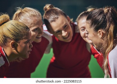 Women, football and team huddle on field at soccer game, motivation and team building for girl sports. Fitness, training and happy girls talk at soccer match in support of winning teamwork and goals. - Powered by Shutterstock