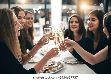 Women, friends and celebration with champagne in restaurant for toast, sushi and dinner together. Female people, party and sparkling wine for cheers, happiness and fine dining for girls night out - Powered by Shutterstock