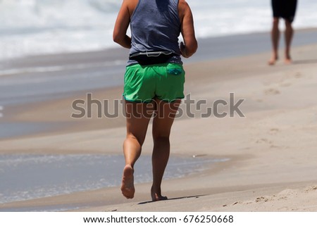 Similar – Image, Stock Photo Runner woman getting fanny pack ready for running