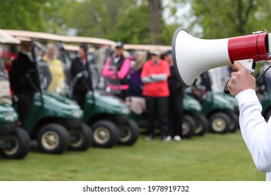women golfers are given final instructions prior to starting their round.