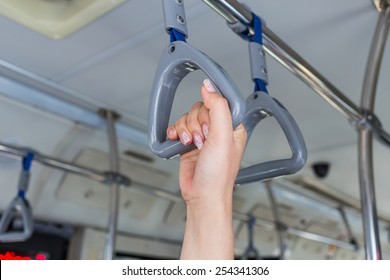 Women Hand Handle Loop In The Subway