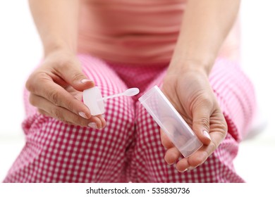 Women Hand Holding Stool Test