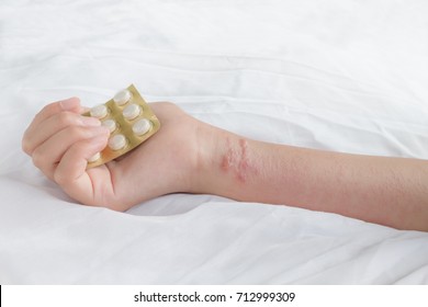 Women Hand Holding Tablet Panel With Poison Ivy Rash On Arm On White Background