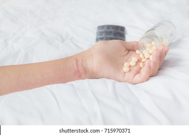 Women Hand Holding Tablet Panel With Poison Ivy Rash On Arm On White Background