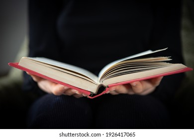 Women hand open book for reading, concept background