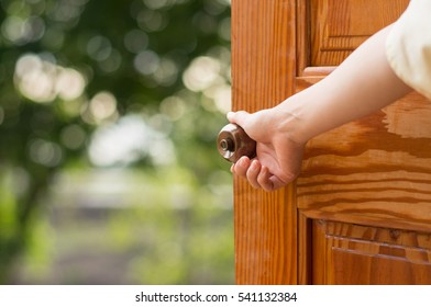 Women hand open door knob or opening the door. - Shutterstock ID 541132384