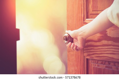 Women Hand Open Door Knob Or Opening The Door.