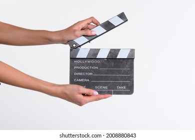 Women Hands Holding Clapper Board Making Video Cinema In Studio.Movie Production Clapper Board, Slate Film.Action, Theatre Day.cut, Director, Film Industry, Bollywood, Hollywood.Video Live Streaming.