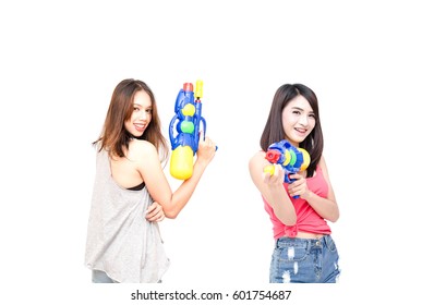 Women happy travelers Holding a water gun Festival celebrate national culture party in Bangkok Thailand tradition New year call Song Kran festival on white background. Thailand New year concept. 