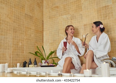 Women having fun in luxury spa salon