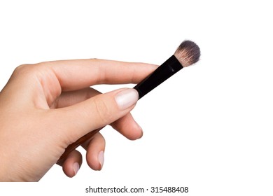 A women holding a set of makeup brushes - Shutterstock ID 315488408