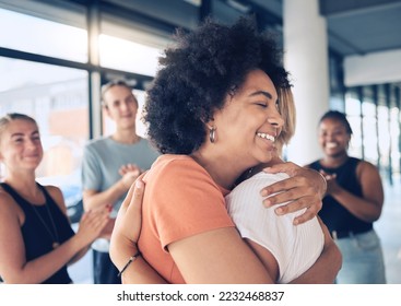 Women, hug and support of friends with group applause for counseling, therapy and trust for psychology and stress management. Group of people together for mental health, healing and help at workshop