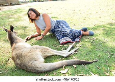 A Women With Kangaroo In Australia Zoo