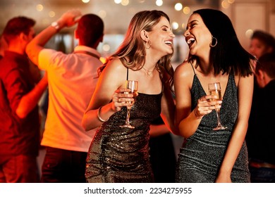 Women, laughing or bonding in champagne night party, clubbing event or birthday celebration in New York. Smile, happy people or friends with alcohol glasses on luxury restaurant or disco dance floor - Shutterstock ID 2234275955