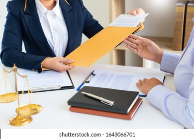 Women Lawyer Discussing With Clients In Courtroom. Justice And Law ,attorney, Court Judge, Meeting Concept.