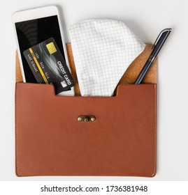 Women Leather Bag With Necessary Items Cloth Masks, Credit Card,pen And Mobile Phone For Hygiene, Cleaning And Protect From Covid-19. Coronavirus,top View