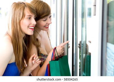 Women Looking In Shop Window