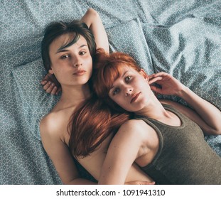 Women Lying On The Bed, Young Lesbians Kisses And Hugs