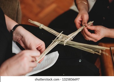 Women Making A St Brigids Cross