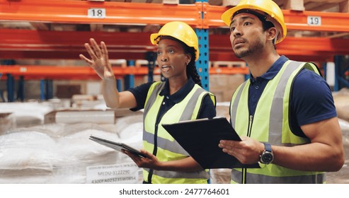 Women, man and tablet in discussion at warehouse for logistics, cargo and teamwork at global shipping company. People, touchscreen and talk with app for boxes, distribution or supply chain in factory - Powered by Shutterstock