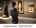 Women in the museum looks at art exhibitions