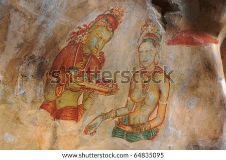 Women with offerings of flowers: one of the 5th century frescoes at the ancient rock fortress of Sigiriya, a UNESCO World Heritage Site in Sri Lanka.
