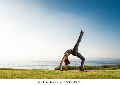 Women On Cliff Yoga Position Stock Photo Shutterstock