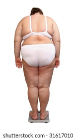 Women With Overweight In Underwear From Behind On Scales