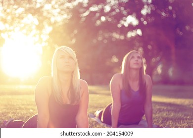 Women In Park Doing Yoga With Instagram Filter