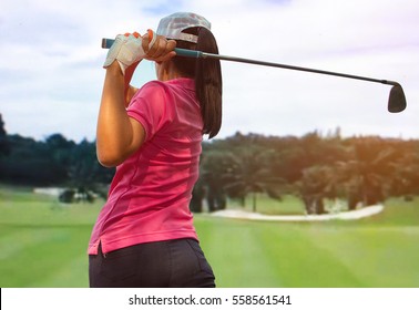 Women Player Golf Swing Shot On Course 