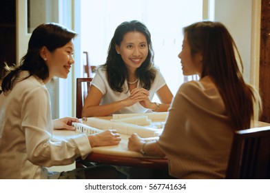 Women Playing Mahjong