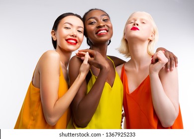 Women posing. Stylish women with different skin color posing for diverse and equality photo shoot