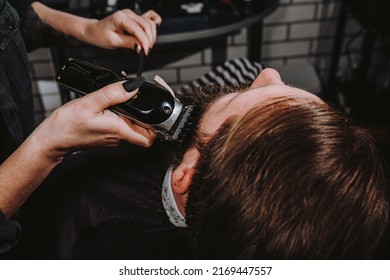 Women Professional Hairdresser Serving Client With Thick Big Beard By Clipper, Handsome Brutal Stylish Young Man Getting Trendy Haircut , Black Barber Shop Room