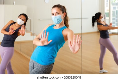 Women In Protection Face Masks Dancing Aerobics At Lesson In The Modern Dance Class