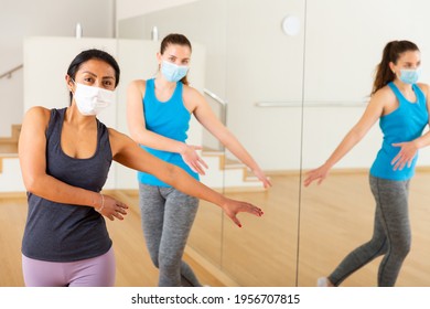 Women In Protection Fase Masks Dancing Aerobics At Lesson In The Modern Dance Class