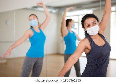 Women In Protection Fase Masks Dancing Aerobics At Lesson In The Modern Dance Class