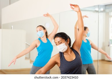 Women In Protection Fase Masks Dancing Aerobics At Lesson In The Modern Dance Class