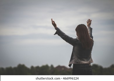 Women Raised Both Hands Up Pray For Blessings To God Style Darke Tones Silhouette