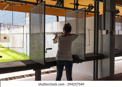Women rifle shooting in the indoor Shooting Range.