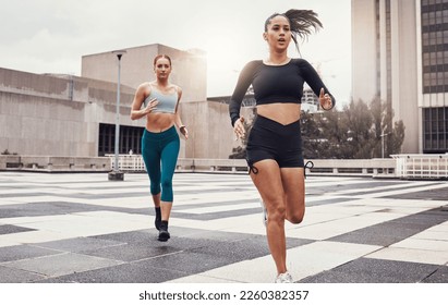 Women, running and fitness in city with cardio, exercise friends and active lifestyle together in Cape Town. Sports, health and body training, runner run race on urban rooftop with healthy people - Powered by Shutterstock